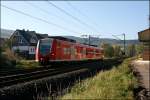 426 014/514 durchfhrt bei Lennestadt-Meggen das schne Sauerland als  Mini-RE16  RE16 (RE 29673)  Ruhr-Sieg-Express  auf dem Weg ins Siegerland.