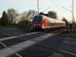 Ein Flirt 429 fhrt am Abend vom 20.April 2009 als RE 33317 Stralsund-Binz am unter Einheimischen bekannten B  Storchennest  bei Bergen/Rgen vorbei.