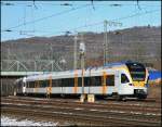 Nun drfen sie fahren...hat ja lang genug gedauert... ET7.01 und ein RRX ET7 sind als ERB92350 (RE13  Maas-Wupper-Express ) von Hamm(Westf) nach Mnchengladbach Hbf unterwegs. (07.03.2010)