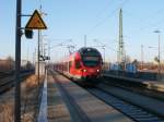 Der zweite RE am Tag aus Rostock erreichte am 07.Mrz 2011 den Bahnhof Bergen/Rgen,der vom 429 026 gefahren wurde.