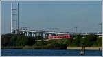 Am 20.09.2011 strebt dieser Flirt auf dem Rügendamm an der Rügenbrücke vorbei der Haltestelle Stralsund/Rügendamm entgegen. Das Bild wurde während einer Hafenrundfahrt von einem Schiff aus aufgenommen. (Hans)
