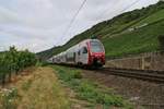 Der CFL KISS Triebzug 2301 in Doppeltraktion mit 429 111 der Süwex mit dem Ziel Koblenz Hbf. Aufgenommen bei Müden an der Mosel am 15.07.2015.