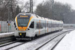 ERB ET 7.02 als RE 3 nach Hamm(Westf.) bei der Einfahrt in Castrop-Rauxel Hbf.