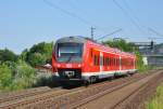 440 824 mit RB 58025 nach Wrzburg.Aufgenommen kurz vor Thngersheim am 24.7.2012