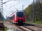 442 211 als RE nach Leipzig fährt am 12.04.2014 durch Rehfeld bei Falkenberg(Elster). 