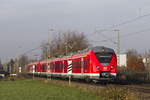 1440 725 auf der Strecke Mönchengladbach - Köln - Köblenz am 06.12.2019 auf freier Strecke kurz hinter dem Bahnhof Pulheim.