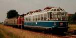 Im August 1988 untersttzt 211 051-8 mit ihrem Zwei-Wagen-Wendezug den Glsernen Zug auf dem Weg nach Rothenburg ob der Tauber.
