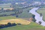 Blick hinab vom Schloss Rothestein bei Bad Sooden-Allendorf ins Werratal. Wer ganz genau hinsieht erkennt einen Cantus-Flirt der sich als R7 auf der Fahrt nach Bebra befindet. Aufgenommen am 09.06.2014.