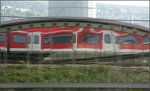 Selbstportait eines S-Bahnzuges -    Im Daimler-Motorenwerk in Stuttgart-Bad Cannstatt spiegelt sich eine S-Bahn, aus der heraus diese Foto gemacht wurde.