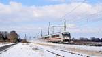 IC 2311 Westerland (Sylt) - Stuttgart Hbf mit Steuerwagen voraus, geschoben von einer unbekannten 101er (Diepholz, 11.02.2021).