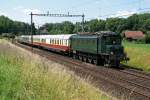 SBB: Ae 4/7 11026 mit einem Sonderzug Zweisimmen - Basel Badischer Bahnhof bei Busswil im Mai 2008.