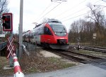 R 5647 von Lindau Hbf nach Bludenz berfhrt gerade die Grenze von Deutschland nach sterreich kurz vor dem Bhf Lochau-Hrbranz am 20.03.2010.
