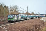 In Doppeltraktion fährt 193 211/193 xxx mit einem langen Autotransportzug in Langenisarhofen nach Nord vorüber.Bild 3.1.2019