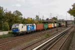 WLC 193 980 mit Containerzug in Hamburg Hausbruch, am 20.09.2018.