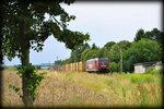 185 513-9 mit einem Containerzug in Zschortau, am 21.07.2016.