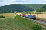 145 086 mit einem Containerzug bei Harrbach Richtung Würzburg, 23.07.2015