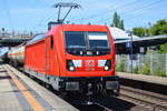 DB Cargo mit 187 118 [NVR-Number: 91 80 6187 118-5 D-DB] und einigen Kesselwagen am 14.06.18 Bf. Berlin-Hohenschönhausen.