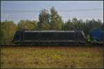 boxXpress 185 563-4 mit dem LKW Walter-KLV am 16.09.2014 durch die Berliner Wuhlheide (NVR-Nummer 91 80 6185 563-4 D-DISPO)