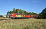 DB Cargo mit den beiden Vectrons 193 300-1 und 193 329-0 in Doppeltraktion und einem Erzzug im Schlepp.