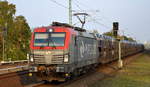PKP CARGO S.A., Warszawa [PL] mit  EU46-504  [NVR-Nummer: 91 51 5370 016-5 PL-PKPC] mit PKW-Transportzug Richtung Wustermark am 23.10.19 Durchfahrt Berlin-Jungfernheide.