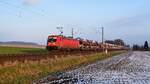 DB Cargo 187 163-1 mit Autotransportzug in Richtung Osnabrück (bei Melle, 19.01.2024).