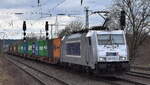 METRANS Rail s.r.o., Praha [CZ] mit ihrer  386 039-2  [NVR-Nummer: 91 54 7386 039-2 CZ-MT] und einem Containerzug am 11.03.24 Höhe Bahnhof Saarmund.