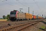 Am Morgen des 11.07.2013 fuhr Crossrail 185 602-0 mit einem buntem Containerzug durch Orschweier gen Freiburg.