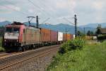 Crossrail 185 593-1 am 01.08.2014 bei Kollmarsreute mit einem Containerzug gen Norden.