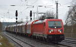 DB Cargo AG [D] mit  187 154  [NVR-Nummer: 91 80 6187 154-0 D-DB] und gemischtem Güterzug Richtung Ziltendorf EKO am am 03.03.20 Bf. Saarmund. 