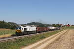 247 058 mit einem gemischten Güterzug aus Sulzbach/Rosenberg kommend am 4. August 2022 mit dem  Drei-Kirchen-Blick .