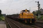 Reuschlng Lok 57 mit einem Stahlzug in Dsseldorf Rath am 21.07.2010