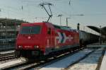 185 603-8 der HGK (mit Werbung von ARS Altman) zeiht einen Kesselwagenzug am 02.02.2012 durch Kaiserslautern