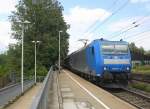 185 511-3  von Railtraxx kommt als Umleiter mit einem langen  schweren Coilzug aus Linz Voestalpine(A) nach Antwerpen Waaslandhaven(B) und fährt durch Kohlscheid aus Richtung Herzogenrath und