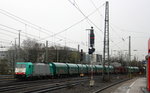 2902 von Alpha Trains kommt aus Richtung Montzen/Belgienmit eineim Coilzug aus Belgien nach Köln-Gremberg und fährt in Aachen-West ein. 
Aufgenommen vom Bahnsteig in Aachen-West. 
Bei Regenwetter am Nasskalten Nachmittag vom 31.3.2016.