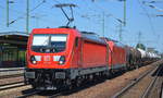 DB Cargo mit  187 138  [NVR-Number: 91 80 6187 138-3 D-DB] mit 185 169-0 und gemischten Kesselwagenzug am Haken am 04.07.18 Bf. Flughafen Berlin-Schönefeld.