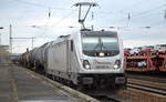 RheinCargo GmbH & Co. KG mit der  187 071-6  [NVR-Number: 91 80 6187 071-6 D-RHC] und Kesselwagenzug (Erdölprodukte) am 29.01.19 Bf. Flughafen Berlin-Schönefeld.