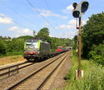475 402-4 von BLS kommt mit einem KLV-TTS-Zug aus Piacenza(I) nach Bierset-Awans(B) und kommt aus Köln-Süd,Köln-West,Köln-Ehrenfeld,Kerpen,Horrem,Buir,Merzenich,Düren,Langerwehe,Eschweiler-Hbf,Stolberg-Hbf(Rheinland) und fährt durch Aachen-Eilendorf in Richtung Aachen-Rothe-Erde,Aachen-Hbf,Aachen-Schanz,Aachen-West. 
Aufgenommen vom Bahnsteig 2 in Aachen-Eilendorf. 
Bei Sommerwetter am Nachmittag vom 15.6.2019.