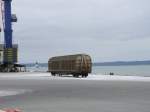 Einsam stand am 19.Februar 2011 im Mukraner Hafen dieser Schiebewandwagen.Da dieser Teil des Hafens nicht ffentlich zugnglich ist,fotografierte ich den Wagen mit Hilfe von Zoom durch den Zaun.