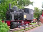 Lok 99211 fristet vor dem alten Leuchtturm in Wangerooge nach 353.025 gefahrenen Kilometer ihr Dasein. (06-08-27)