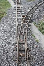 Eine Weiche der Freiburger-Minidampfbahn und ein nachbau einer Originalen Feldbahnweiche.