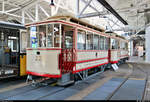 Beiwagen ESS 22, Baujahr 1912, und Triebwagen ESS 7, Baujahr 1912, der ehemaligen Eßlinger Städtische Straßenbahn (ESS) sind im Straßenbahnmuseum Stuttgart ausgestellt.
