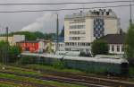 Ehemalige Bahnpostwagen der Deutschen Bundesbahn haben als Geschftsrume am Rand des Bahnhofs Freilassing eine neue Aufgabe gefunden; 27.05.2011