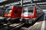 RB59098 von München Hauptbahnhof nach Nürnberg Hauptbahnhof (links im Bild) steht am 14.8.2017 zusammen mit der RB59151 von Treuchtlingen im Münchener Hauptbahnhof.