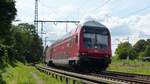 Ein RE50 nach Fulda durchfährt die Kurve nahe der Hanauer Museumseisenbahn.