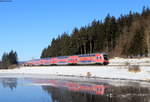 RE 3893 (Oberstdorf-München Hbf) mit Schublok 218 411-7 bei Ruderatshofen 14.2.21