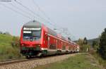 RE 19035 (Stuttgart Hbf-Singen(Hohentwiel)) mit Schublok 146 226-6 bei Neufra 22.4.11