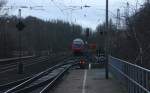 Ein Nachschuss vom RE4 aus Dortmund-Hbf nach Aachen-Hbf und Vorne fährt die 111 014-7 DB und fährt in Richtung Richterich,Laurensberg,Aachen-West.