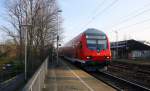 Ein RE4 von Dortmund-Hbf nach Aachen-Hbf und am Zugende ist die 111 127-7 DB kommt die Kohlscheider-Rampe hoch und fährt durch Kohlscheid in Richtung Richterich,Laurensberg,Aachen-West.