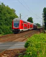 Eine RE7 auf dem Weg nach Krefeld hier am B Broicherseite bei Kaarst, geschoben von der 112 159. 27.7.2013