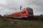 Hier ein RE3 (RE18353) von Schwedt(Oder) nach Elsterwerda, am 1.4.2015 zwischen Helbigstraße und Vierradener Chaussee in Schwedt(Oder). Zuglok war 112 119.